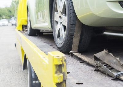 car-transporter-breakdown-lorry-working-using-locked-belt-transport-other-green-car